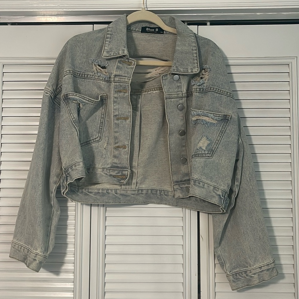 Distressed denim jacket with rhinestone frige